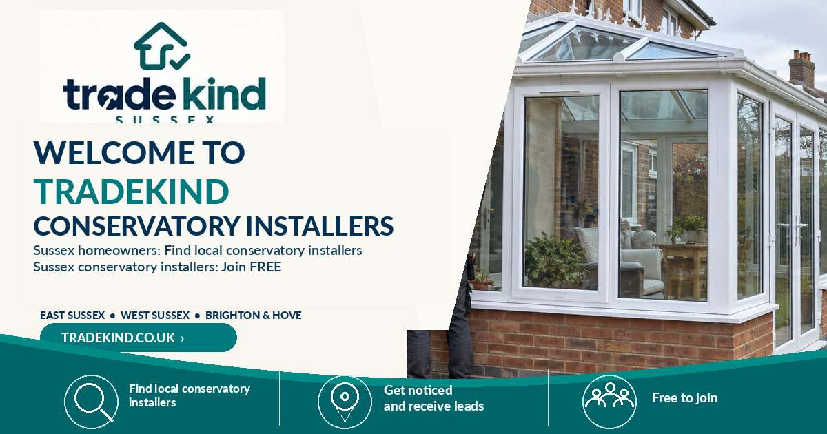 Conservatory installer surveying the base and house connection for a UK conservatory