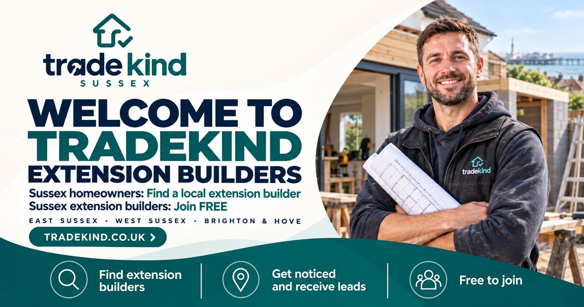 Builder reviewing extension drawings beside a house under construction