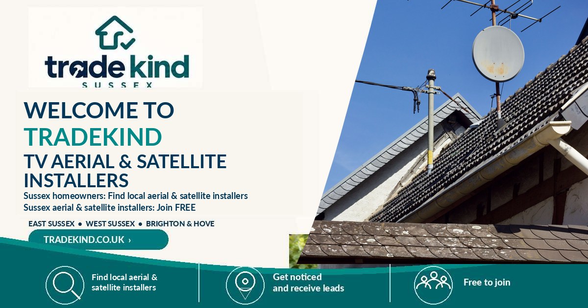 TV aerial installer testing signal and cabling at a UK residential property