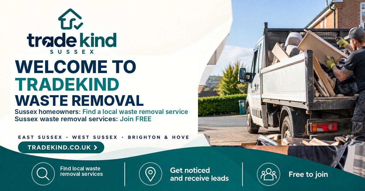 Waste removal team loading household clearance items into a clean commercial van